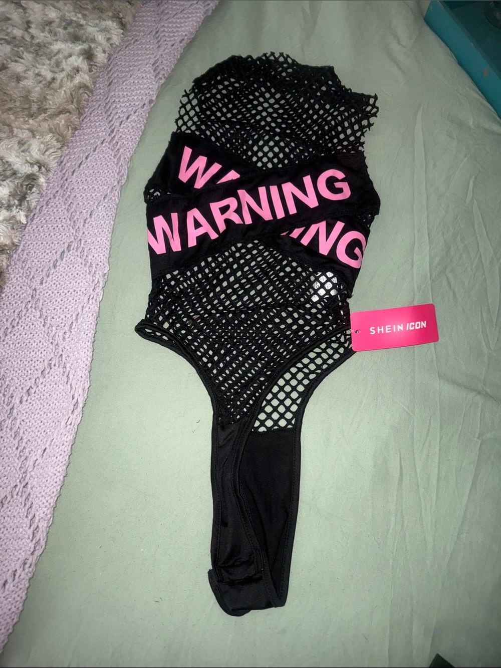 Woman’s sexy Black Mesh One-Piece Swimsuit with Pink 'WARNING' Band